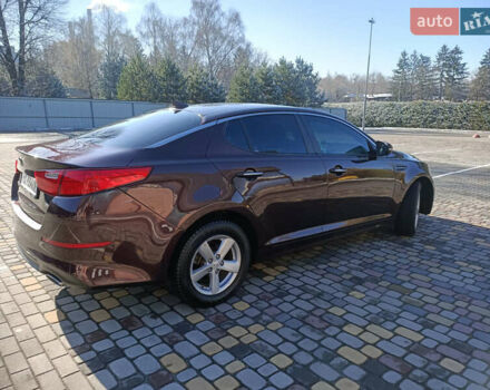 Красный Киа Оптима, объемом двигателя 2.36 л и пробегом 85 тыс. км за 10000 $, фото 2 на Automoto.ua