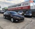 Красный Киа Оптима, объемом двигателя 2.4 л и пробегом 183 тыс. км за 9850 $, фото 1 на Automoto.ua