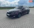 Красный Киа Оптима, объемом двигателя 2.36 л и пробегом 241 тыс. км за 8900 $, фото 1 на Automoto.ua