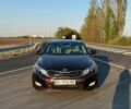 Червоний Кіа Оптіма, об'ємом двигуна 2.4 л та пробігом 144 тис. км за 9500 $, фото 1 на Automoto.ua