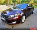 Красный Киа Оптима, объемом двигателя 2.4 л и пробегом 180 тыс. км за 8900 $, фото 1 на Automoto.ua