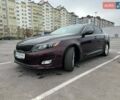 Красный Киа Оптима, объемом двигателя 2.36 л и пробегом 165 тыс. км за 8500 $, фото 1 на Automoto.ua
