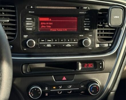 Красный Киа Оптима, объемом двигателя 2.4 л и пробегом 116 тыс. км за 9000 $, фото 4 на Automoto.ua