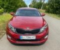 Червоний Кіа Оптіма, об'ємом двигуна 2.36 л та пробігом 200 тис. км за 7000 $, фото 1 на Automoto.ua