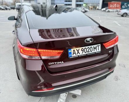 Красный Киа Оптима, объемом двигателя 2.36 л и пробегом 154 тыс. км за 12500 $, фото 14 на Automoto.ua