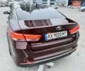 Красный Киа Оптима, объемом двигателя 2.36 л и пробегом 154 тыс. км за 12500 $, фото 14 на Automoto.ua
