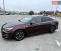 Красный Киа Оптима, объемом двигателя 2.36 л и пробегом 154 тыс. км за 12500 $, фото 6 на Automoto.ua