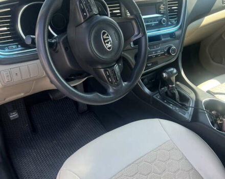 Красный Киа Оптима, объемом двигателя 2.36 л и пробегом 183 тыс. км за 8250 $, фото 10 на Automoto.ua