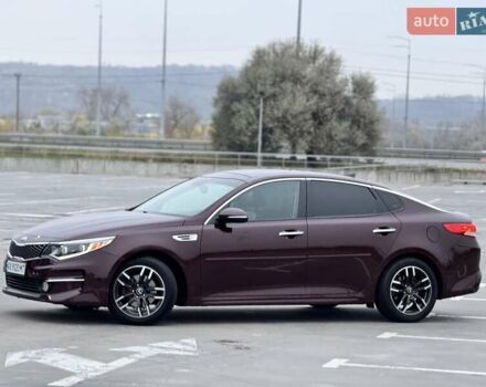 Красный Киа Оптима, объемом двигателя 2.36 л и пробегом 154 тыс. км за 12500 $, фото 2 на Automoto.ua
