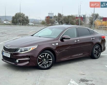 Красный Киа Оптима, объемом двигателя 2.36 л и пробегом 154 тыс. км за 12500 $, фото 4 на Automoto.ua