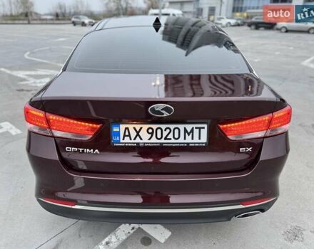 Красный Киа Оптима, объемом двигателя 2.36 л и пробегом 154 тыс. км за 12500 $, фото 15 на Automoto.ua