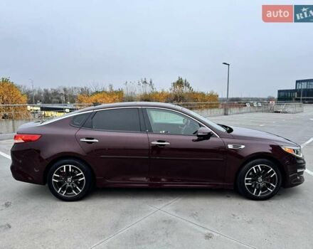 Красный Киа Оптима, объемом двигателя 2.36 л и пробегом 154 тыс. км за 12500 $, фото 18 на Automoto.ua