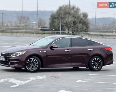 Красный Киа Оптима, объемом двигателя 2.4 л и пробегом 154 тыс. км за 11990 $, фото 1 на Automoto.ua