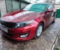 Красный Киа Оптима, объемом двигателя 2.4 л и пробегом 124 тыс. км за 9000 $, фото 1 на Automoto.ua