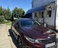 Красный Киа Оптима, объемом двигателя 2.4 л и пробегом 200 тыс. км за 7995 $, фото 1 на Automoto.ua