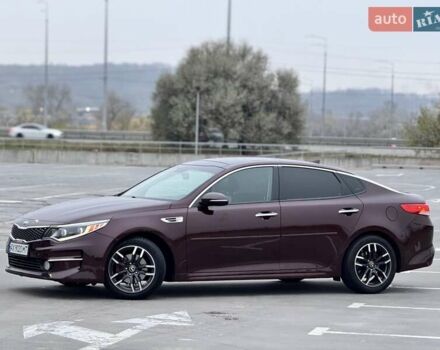Красный Киа Оптима, объемом двигателя 2.36 л и пробегом 154 тыс. км за 12500 $, фото 3 на Automoto.ua