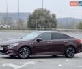 Красный Киа Оптима, объемом двигателя 2.36 л и пробегом 154 тыс. км за 12500 $, фото 3 на Automoto.ua