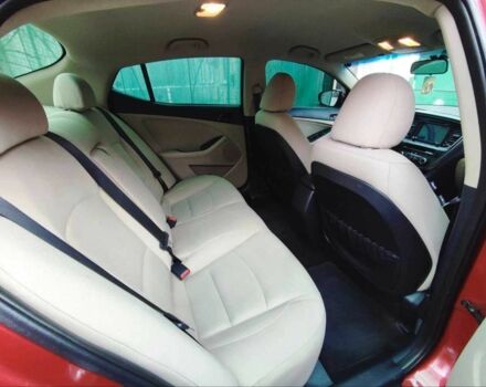 Красный Киа Оптима, объемом двигателя 2.4 л и пробегом 124 тыс. км за 9000 $, фото 4 на Automoto.ua