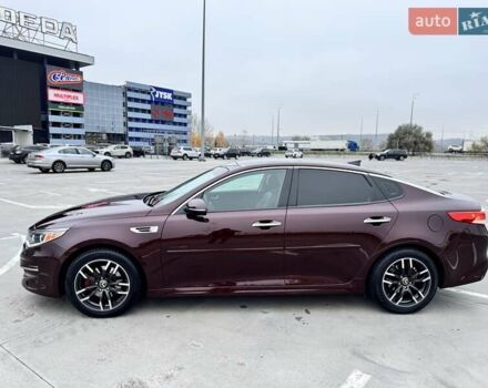 Красный Киа Оптима, объемом двигателя 2.36 л и пробегом 154 тыс. км за 12500 $, фото 9 на Automoto.ua