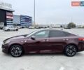 Красный Киа Оптима, объемом двигателя 2.36 л и пробегом 154 тыс. км за 12500 $, фото 9 на Automoto.ua