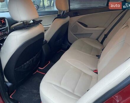 Красный Киа Оптима, объемом двигателя 2.36 л и пробегом 162 тыс. км за 9700 $, фото 14 на Automoto.ua