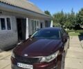 Красный Киа Оптима, объемом двигателя 2.4 л и пробегом 200 тыс. км за 7995 $, фото 1 на Automoto.ua