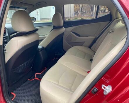 Червоний Кіа Оптіма, об'ємом двигуна 2.4 л та пробігом 162 тис. км за 9700 $, фото 13 на Automoto.ua