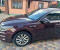Красный Киа Оптима, объемом двигателя 2.36 л и пробегом 141 тыс. км за 10700 $, фото 7 на Automoto.ua