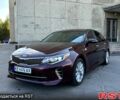 Красный Киа Оптима, объемом двигателя 2.4 л и пробегом 159 тыс. км за 11000 $, фото 1 на Automoto.ua