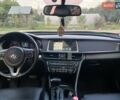Красный Киа Оптима, объемом двигателя 2.36 л и пробегом 141 тыс. км за 10700 $, фото 8 на Automoto.ua