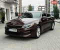 Красный Киа Оптима, объемом двигателя 2.4 л и пробегом 162 тыс. км за 9999 $, фото 1 на Automoto.ua
