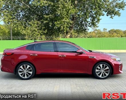 Красный Киа Оптима, объемом двигателя 2 л и пробегом 98 тыс. км за 11800 $, фото 2 на Automoto.ua