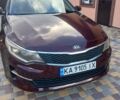 Червоний Кіа Оптіма, об'ємом двигуна 2.36 л та пробігом 141 тис. км за 10700 $, фото 1 на Automoto.ua