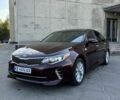 Красный Киа Оптима, объемом двигателя 2.4 л и пробегом 159 тыс. км за 11500 $, фото 1 на Automoto.ua