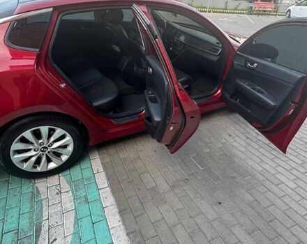 Красный Киа Оптима, объемом двигателя 2.36 л и пробегом 140 тыс. км за 13500 $, фото 11 на Automoto.ua
