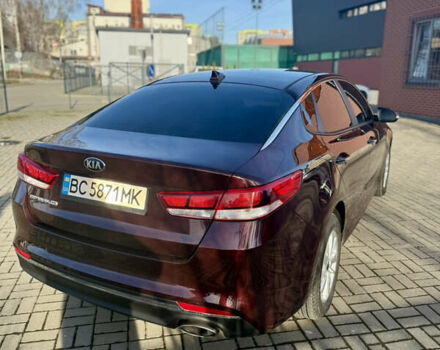 Красный Киа Оптима, объемом двигателя 2.36 л и пробегом 91 тыс. км за 10999 $, фото 12 на Automoto.ua