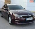 Червоний Кіа Оптіма, объемом двигателя 2.36 л и пробегом 85 тыс. км за 12500 $, фото 1 на Automoto.ua