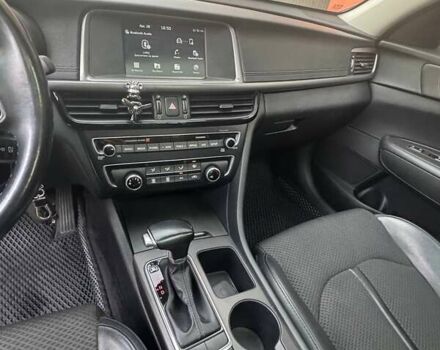 Красный Киа Оптима, объемом двигателя 2.36 л и пробегом 140 тыс. км за 13500 $, фото 12 на Automoto.ua