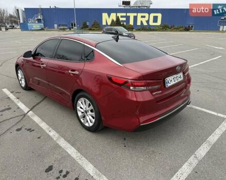 Красный Киа Оптима, объемом двигателя 2.4 л и пробегом 145 тыс. км за 12900 $, фото 2 на Automoto.ua