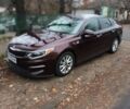 Красный Киа Оптима, объемом двигателя 2.36 л и пробегом 112 тыс. км за 13900 $, фото 1 на Automoto.ua