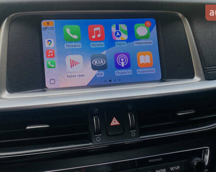 Красный Киа Оптима, объемом двигателя 2.36 л и пробегом 113 тыс. км за 14500 $, фото 9 на Automoto.ua