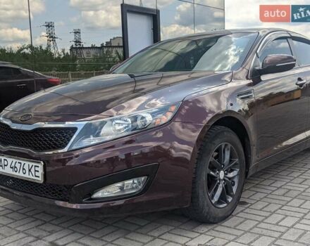 Червоний Кіа Оптіма, об'ємом двигуна 2.4 л та пробігом 257 тис. км за 8500 $, фото 1 на Automoto.ua