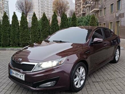 Красный Киа Оптима, объемом двигателя 2.36 л и пробегом 164 тыс. км за 10100 $, фото 1 на Automoto.ua