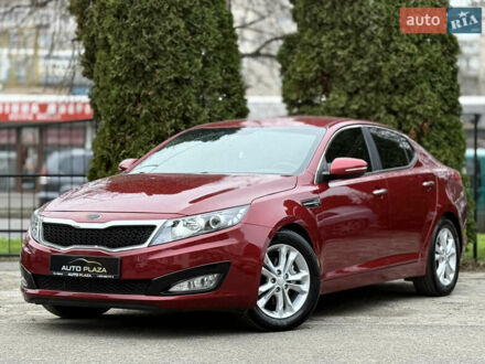 Красный Киа Оптима, объемом двигателя 2.36 л и пробегом 183 тыс. км за 8500 $, фото 1 на Automoto.ua