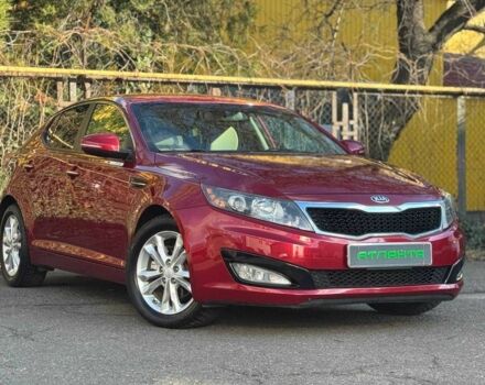 Красный Киа Оптима, объемом двигателя 2.4 л и пробегом 145 тыс. км за 9000 $, фото 1 на Automoto.ua
