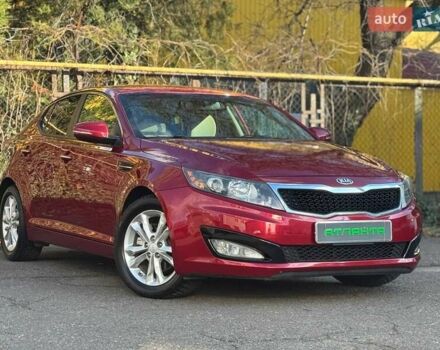 Красный Киа Оптима, объемом двигателя 2.4 л и пробегом 145 тыс. км за 9000 $, фото 1 на Automoto.ua