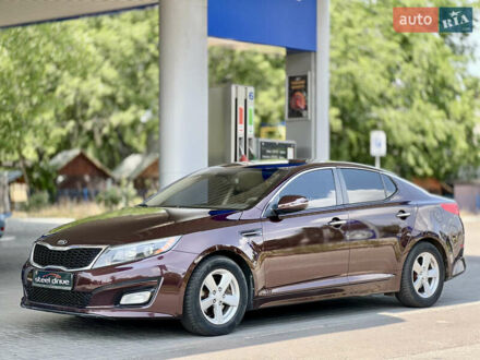 Красный Киа Оптима, объемом двигателя 2.4 л и пробегом 184 тыс. км за 9499 $, фото 1 на Automoto.ua