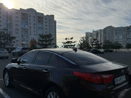 Красный Киа Оптима, объемом двигателя 2.36 л и пробегом 177 тыс. км за 8700 $, фото 1 на Automoto.ua