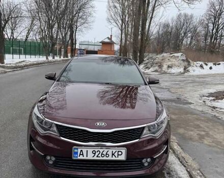 Красный Киа Оптима, объемом двигателя 2.4 л и пробегом 155 тыс. км за 12700 $, фото 1 на Automoto.ua
