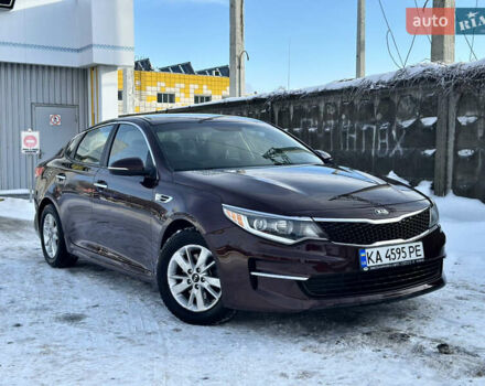 Красный Киа Оптима, объемом двигателя 2.36 л и пробегом 145 тыс. км за 10500 $, фото 1 на Automoto.ua